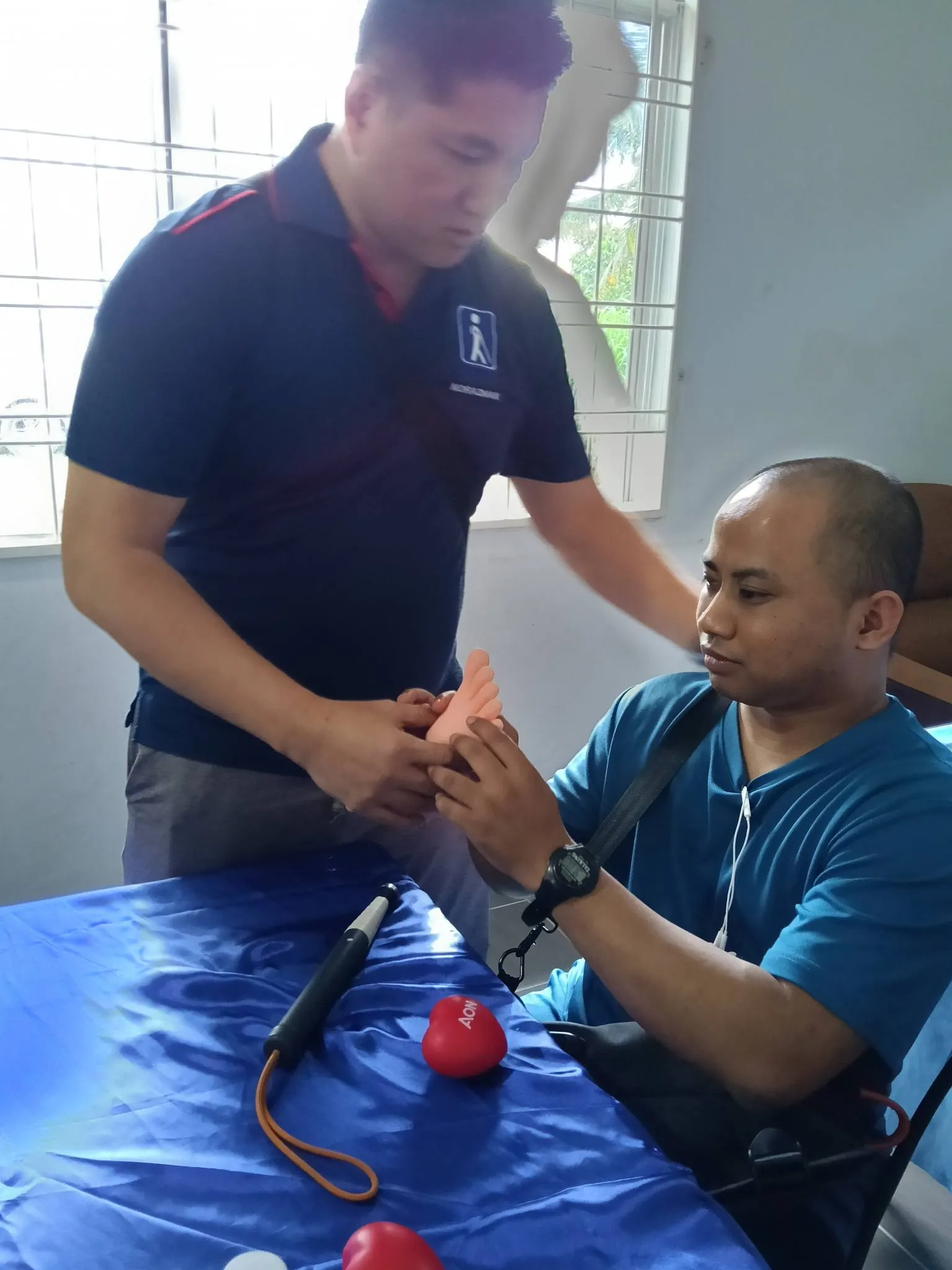 Visually impaired person receiving training